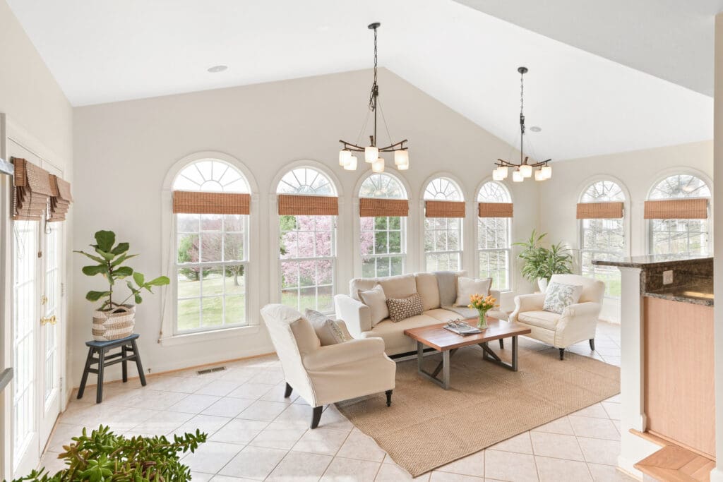 A tastefully staged room with crown molding and hardwood floors designed to highlight timeless charm and comfort.